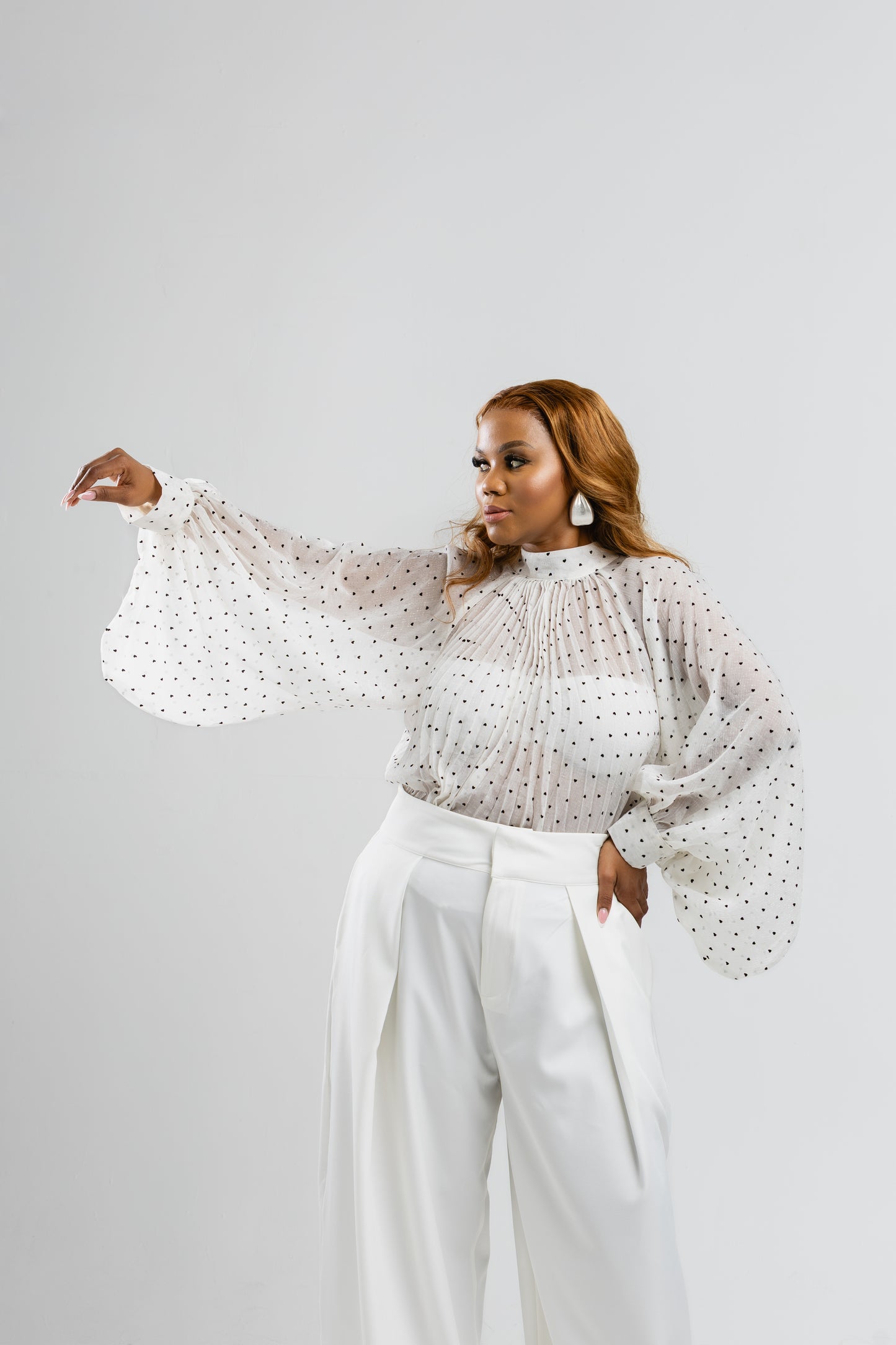 White polka blouse