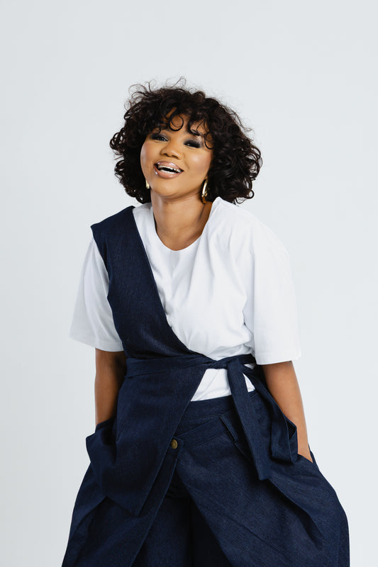 Off Cut Denim top in deep indigo with asymmetric shoulder panel and waist tie, front view